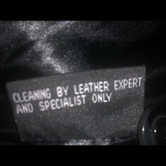 Black leather coat with pockets in a size large. The length above the knees. - Picture 5 of 5